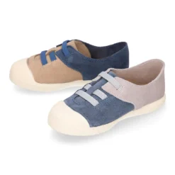 Zapatilla niños con puntera y cordones elásticos en piel serraje.