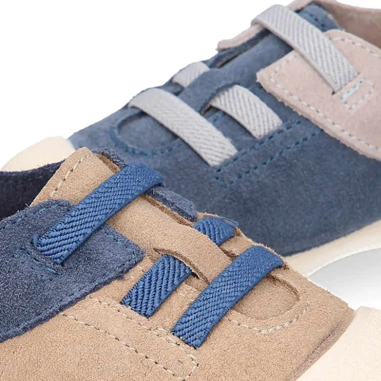Zapatilla niños con puntera y cordones elásticos en piel serraje.