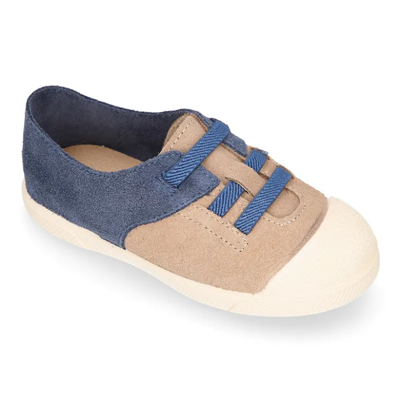 Zapatilla niños con puntera y cordones elásticos en piel serraje.