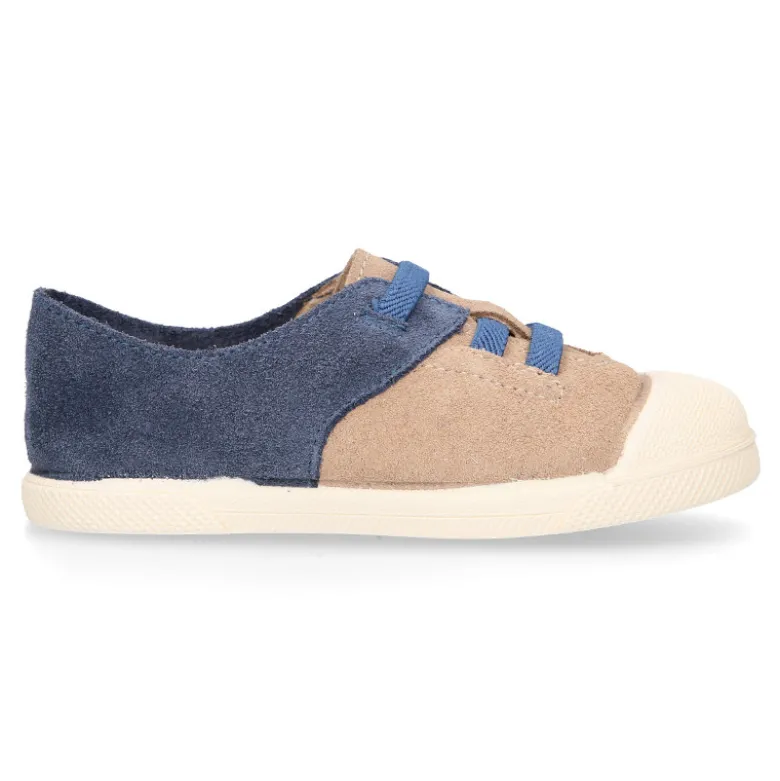 Zapatilla niños con puntera y cordones elásticos en piel serraje.