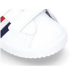 Zapatilla niño sin cordones con bandera en piel lavable.