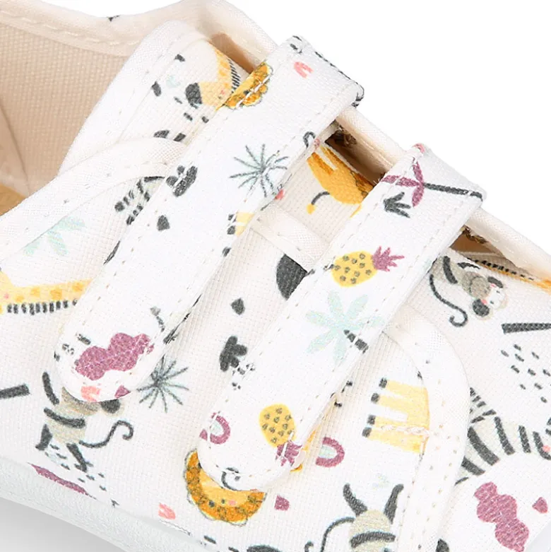 Zapatilla niño sin cordones en lona algodón estampado SELVA y puntera.