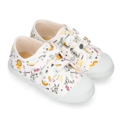 Zapatilla niño sin cordones en lona algodón estampado SELVA y puntera.