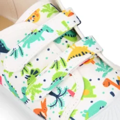 Zapatilla niño sin cordones en lona algodón estampado DINOS y puntera.