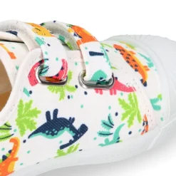 Zapatilla niño sin cordones en lona algodón estampado DINOS y puntera.