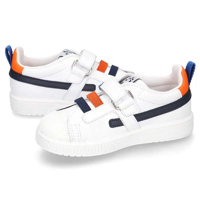 Zapatilla niño sin cordones y con ELÁSTICOS en piel lavable.