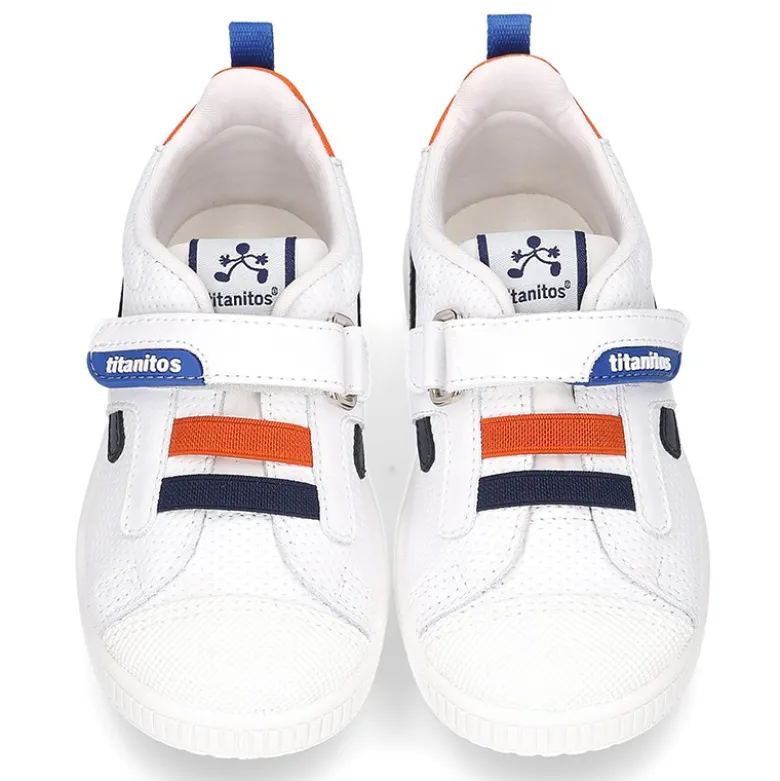 Zapatilla niño sin cordones y con ELÁSTICOS en piel lavable.