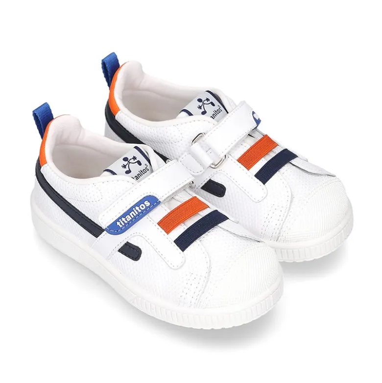 Zapatilla niño sin cordones y con ELÁSTICOS en piel lavable.