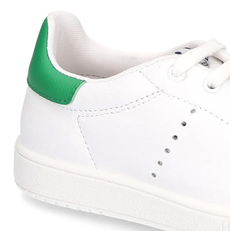 Zapatilla niños Moda con cordones en piel.