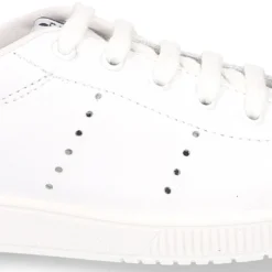Zapatilla niños Moda con cordones en piel.
