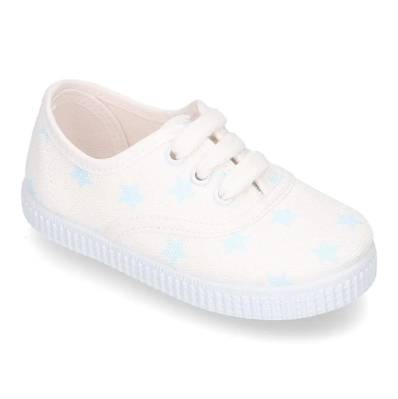 Zapatilla niños tipo Bamba con cordones en lona con estrellas pasteles.