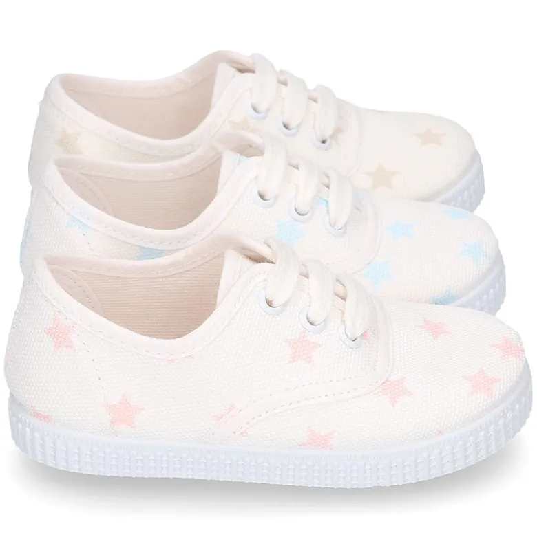 Zapatilla niños tipo Bamba con cordones en lona con estrellas pasteles.