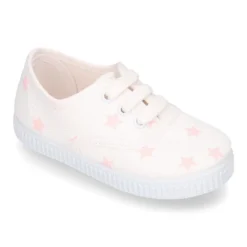 Zapatilla niños tipo Bamba con cordones en lona con estrellas pasteles.