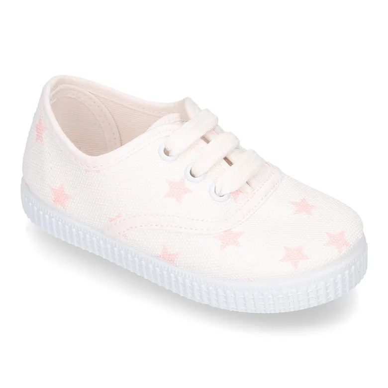 Zapatilla niños tipo Bamba con cordones en lona con estrellas pasteles.