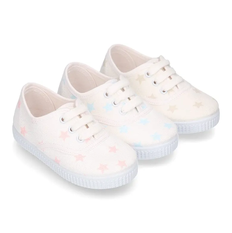 Zapatilla niños tipo Bamba con cordones en lona con estrellas pasteles.