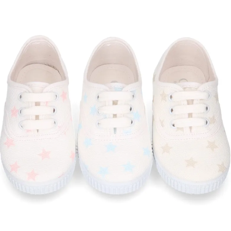 Zapatilla niños tipo Bamba con cordones en lona con estrellas pasteles.