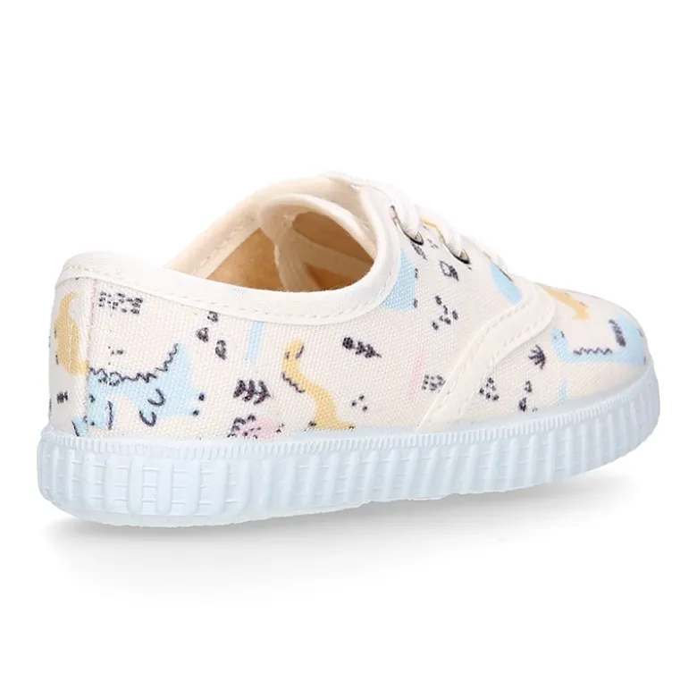 Zapatilla niños tipo Bamba con cordones en lona con DINOSAURIOS.