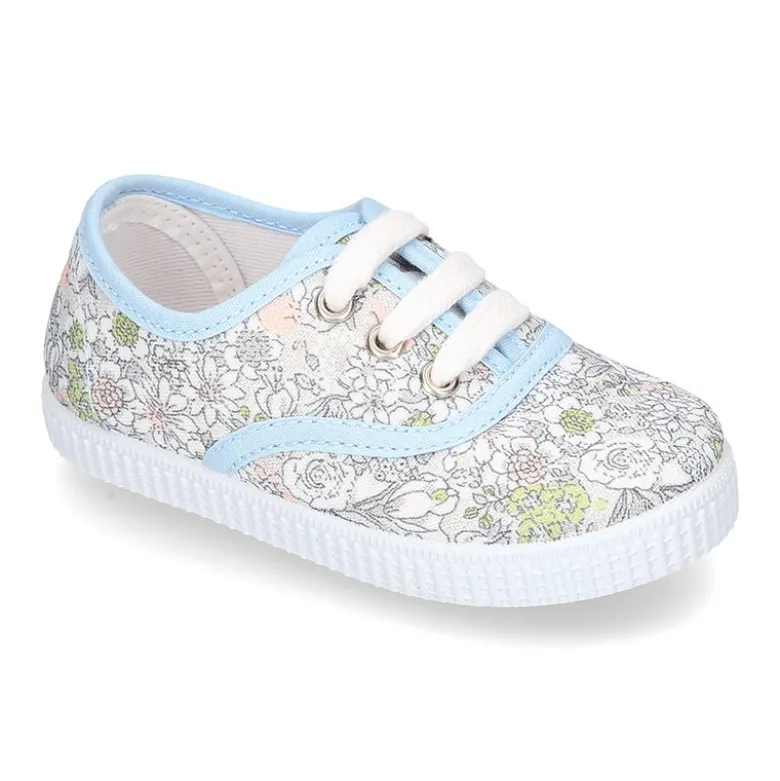 Zapatilla tipo Bamba con cordones en lona algodón con FLORES pasteles.