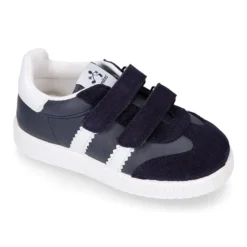 Zapatilla tipo Tenis niños sin cordones en piel napa combinada con piel serraje.