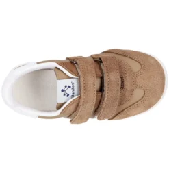 Zapatilla tipo Tenis niños sin cordones en piel napa combinada con piel serraje.