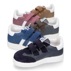 Zapatilla tipo Tenis niños sin cordones en piel napa combinada con piel serraje.