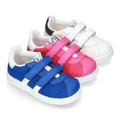 Zapatilla VERANO sin cordones y con rayas laterales en piel lavable combinada con lona rejilla.