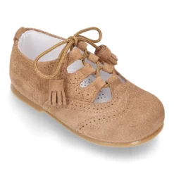 Zapatito inglés niños sin lengüeta en piel serraje.