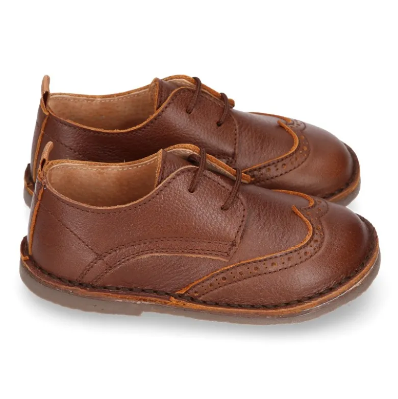 Zapatito Niño tipo blucher con picados y pala vega en piel.