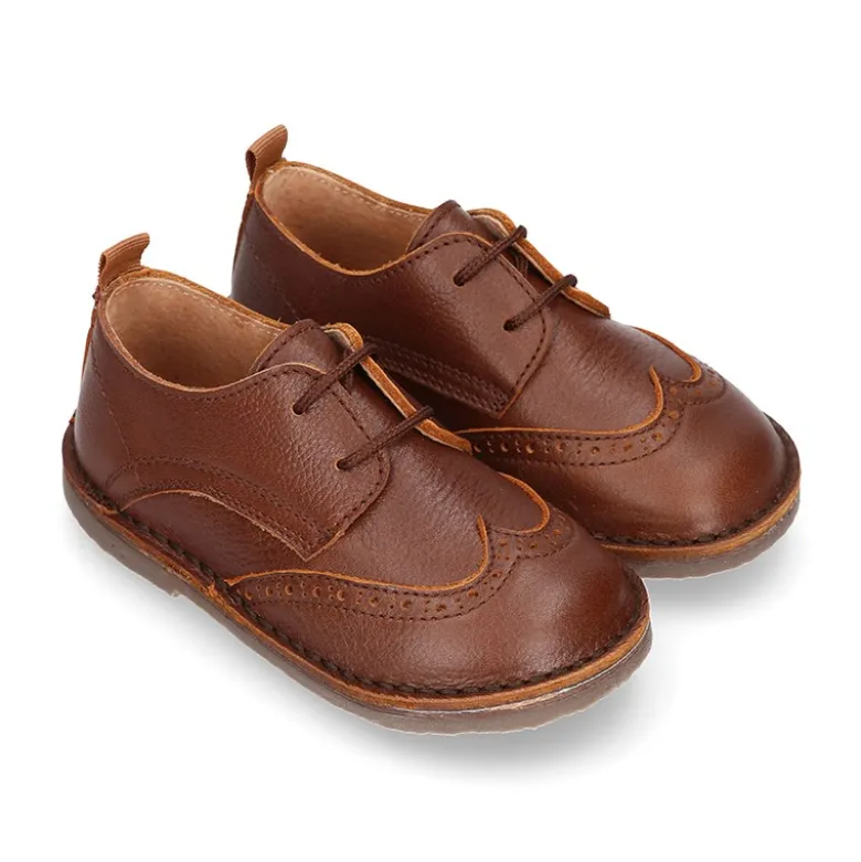 Zapatito Niño tipo blucher con picados y pala vega en piel.