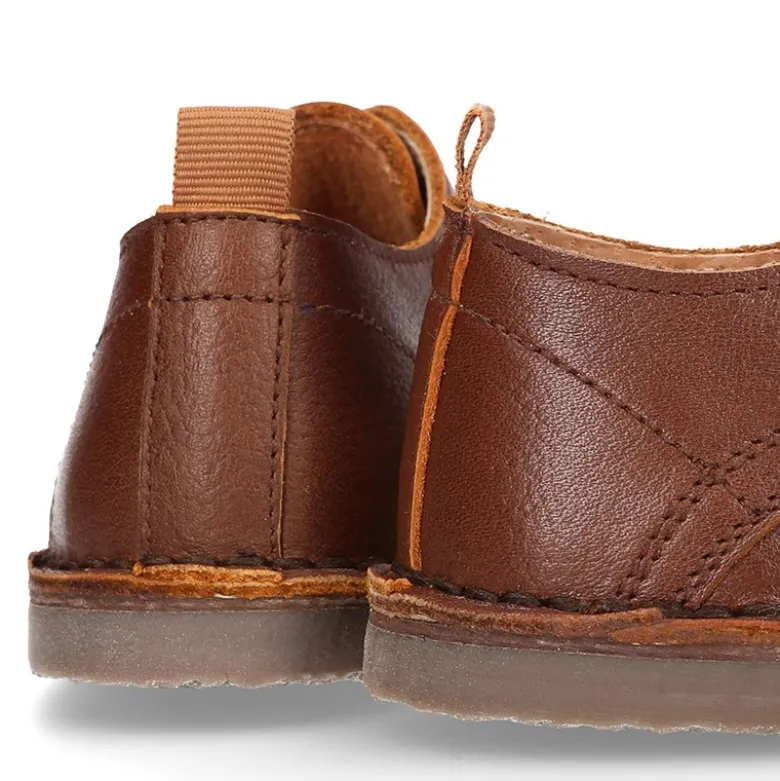 Zapatito Niño tipo blucher con picados y pala vega en piel.