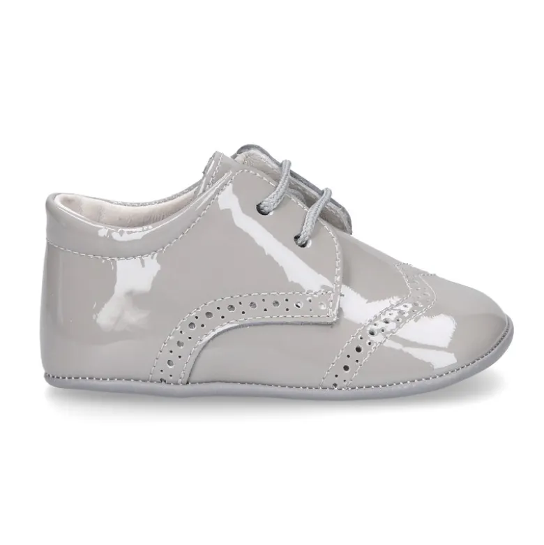 Zapatito tipo Blucher bebé niño en piel charol.