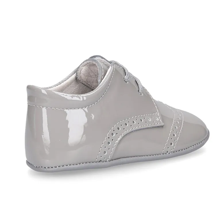 Zapatito tipo Blucher bebé niño en piel charol.