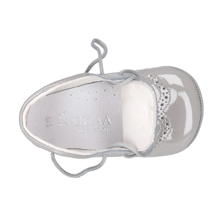 Zapatito tipo Blucher bebé niño en piel charol.