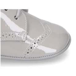 Zapatito tipo Blucher bebé niño en piel charol.