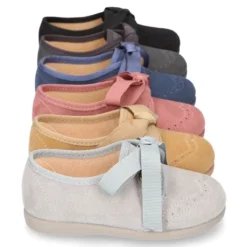 Zapatito tipo Blucher niños con lazos y picados en Serratex.