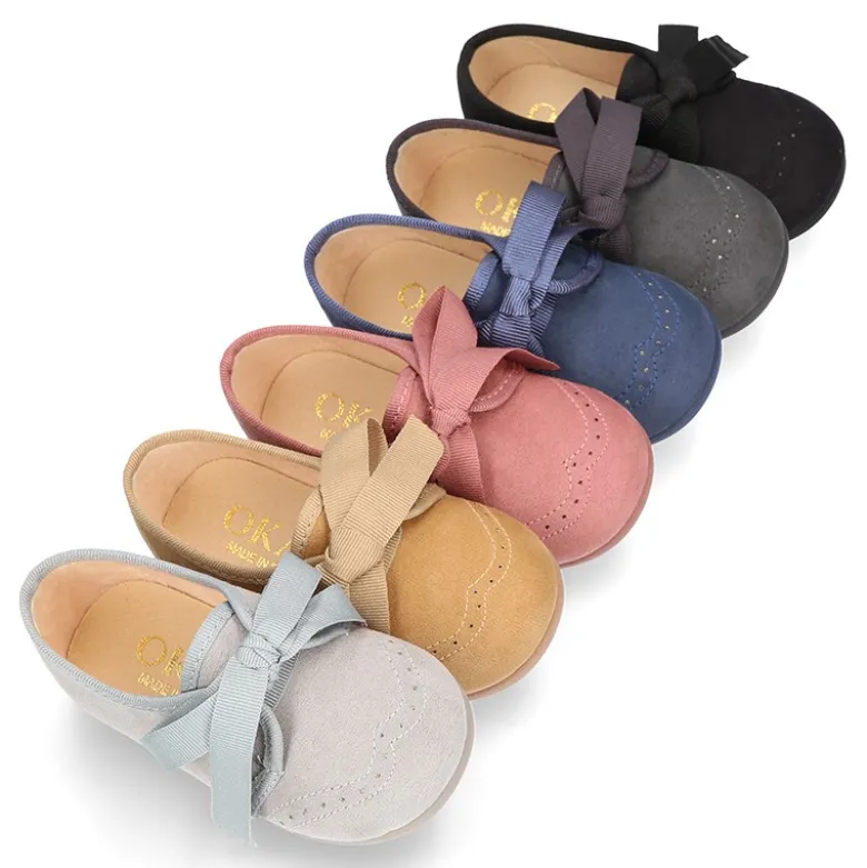 Zapatito tipo Blucher niños con lazos y picados en Serratex.