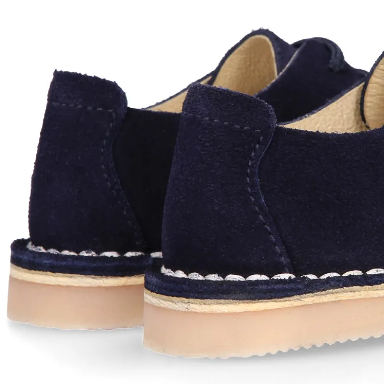 Zapatito tipo blucher primavera con picados en serraje.