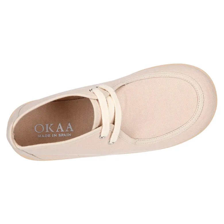 Zapatito tipo walabi con cordones en lona piqué.