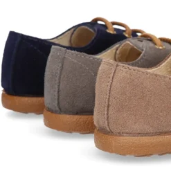 Zapato blucher para niño con cordones y picados en piel serraje