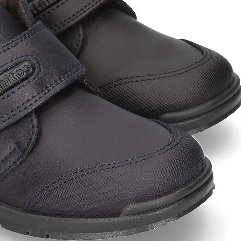 Zapato colegial niño tipo Botita sin cordones en piel lavable.