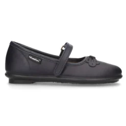 Zapato colegial tipo Mercedita con cierre adherente y lazo en piel lavable para niñas.