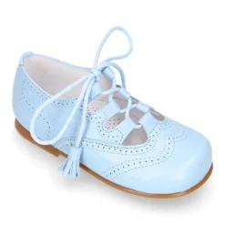 Zapato niño INGLES con cordones y borlas en piel napa AZUL.