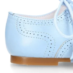 Zapato niño INGLES con cordones y borlas en piel napa AZUL.