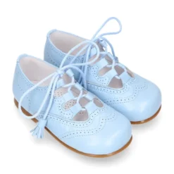 Zapato niño INGLES con cordones y borlas en piel napa AZUL.