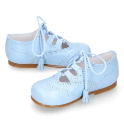 Zapato niño INGLES con cordones y borlas en piel napa AZUL.