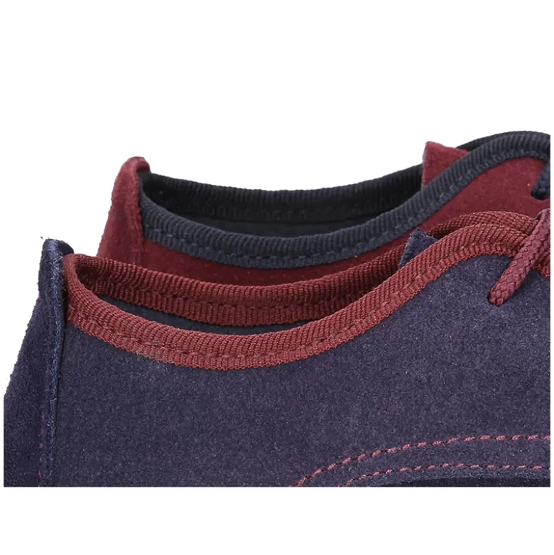 Zapato tipo Blucher de vestir con piso estilizado en piel serraje.