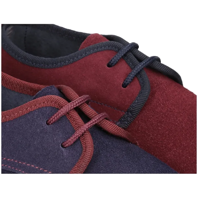 Zapato tipo Blucher de vestir con piso estilizado en piel serraje.